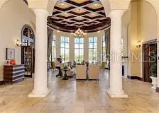a view of a livingroom with furniture and windows