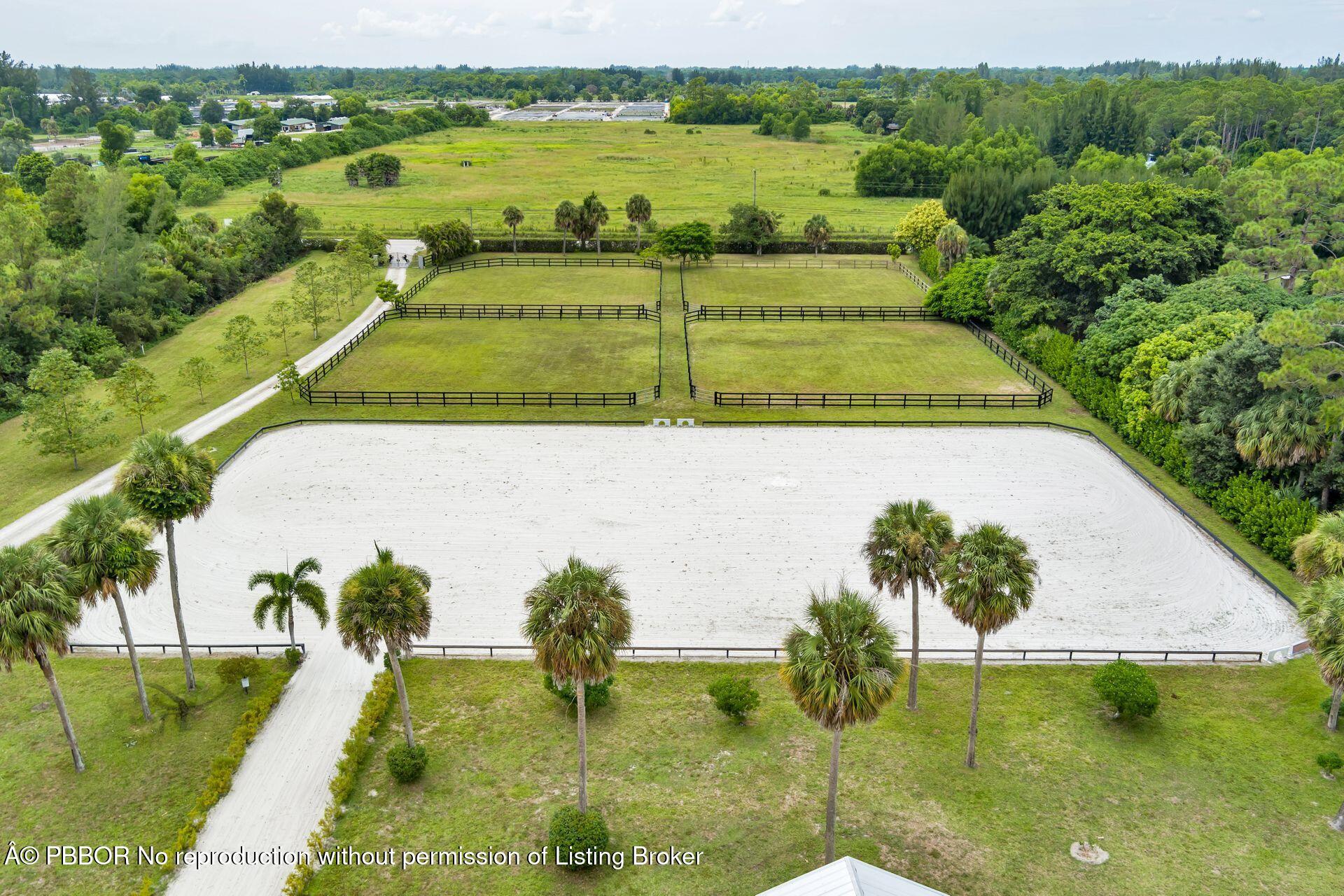 2770 E Road Loxahatchee, FL 33470 - Photo 47 of 51 a view of a lake with a yard