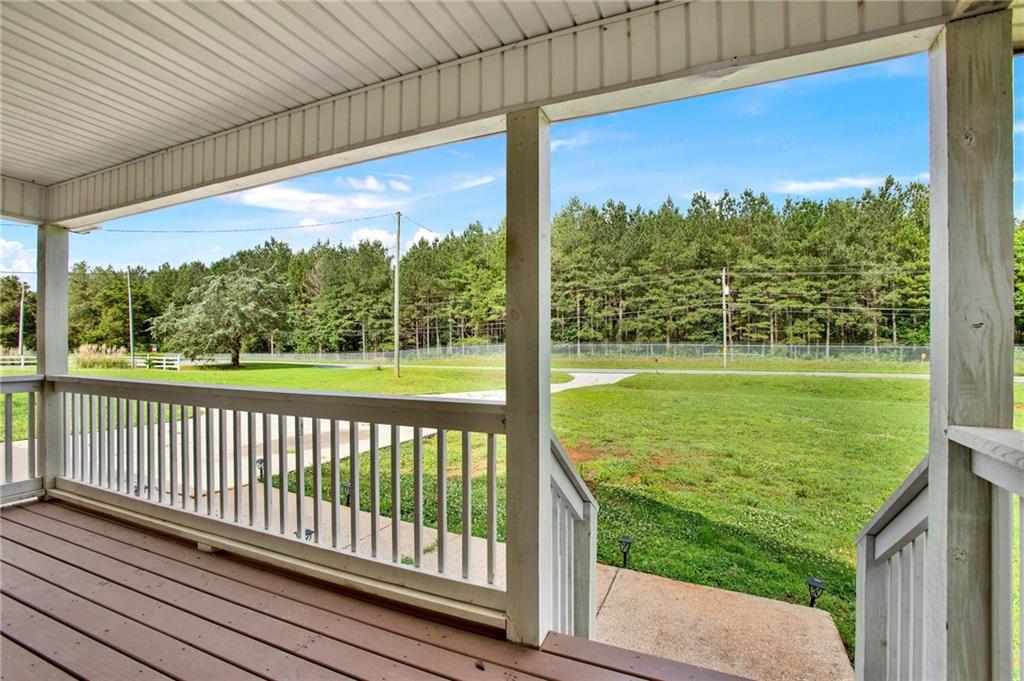 76 Picklesimer Road Southwest Cartersville, GA 30120 - Photo 6 of 43 a view of a porch with a yard
