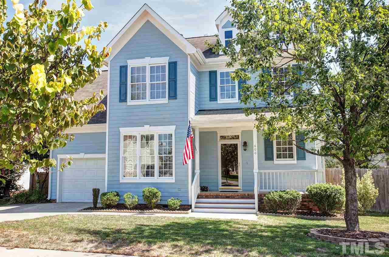 600 Hanska Way Raleigh, NC 27610 - Photo 1 of 18 a front view of a house with a yard