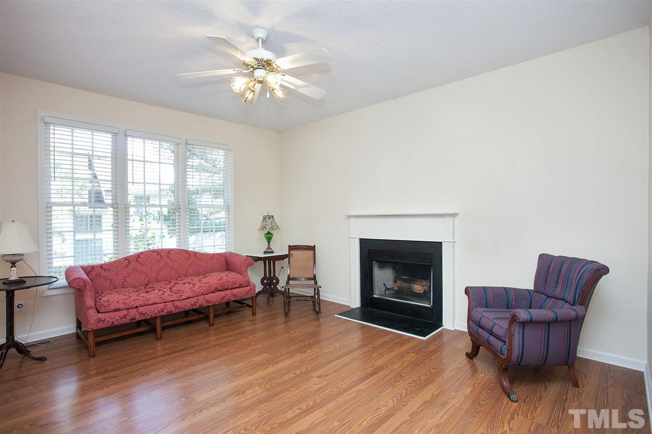 600 Hanska Way Raleigh, NC 27610 - Photo 7 of 18 a living room with furniture and a fireplace