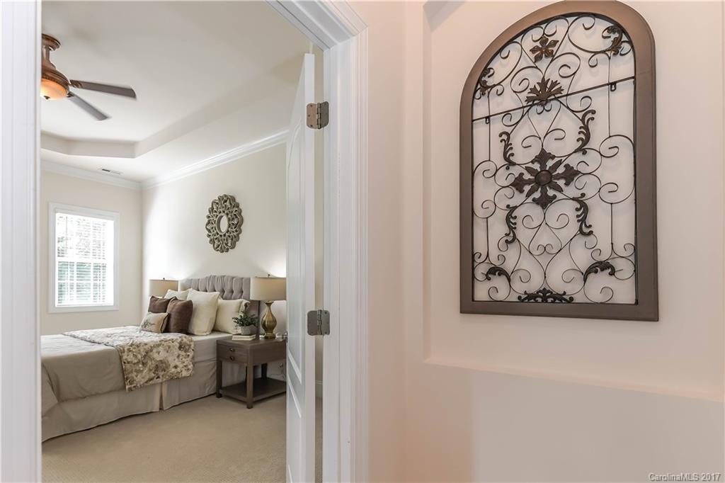 10944 Round Rock Road Charlotte, NC 28277 - Photo 14 of 23 a bedroom with a bed and a couch