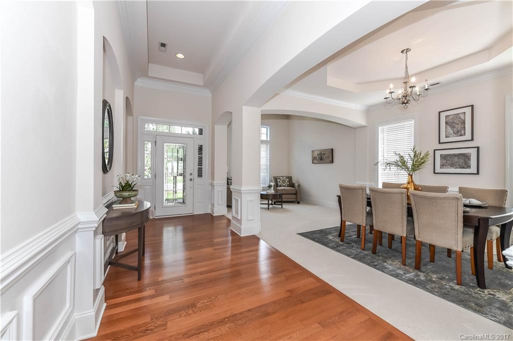 10944 Round Rock Road Charlotte, NC 28277 - Photo 4 of 23 a living room with furniture and wooden floor