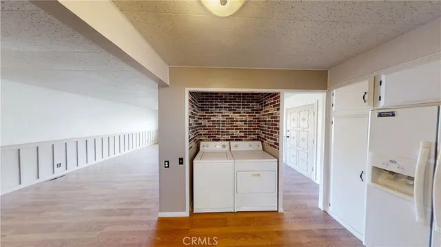 a view of entryway with wooden floor
