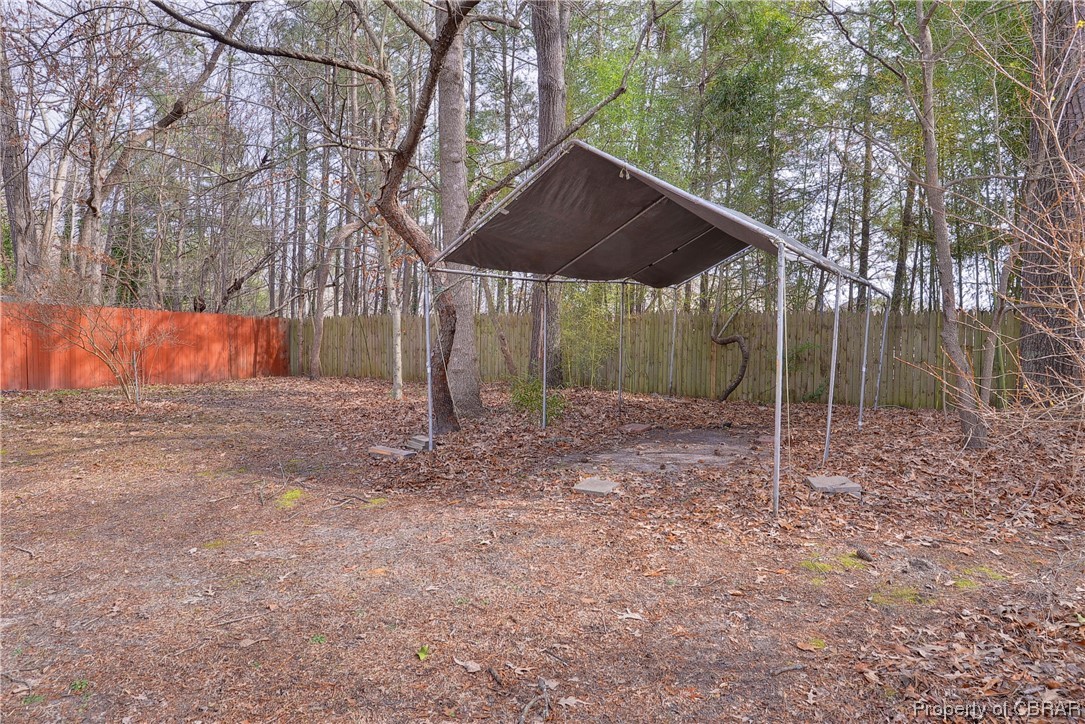 3159 Old Stage Road Toano, VA 23168 - Photo 34 of 44 Car/boat cover in backyard