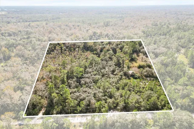 a view of yard covered with snow