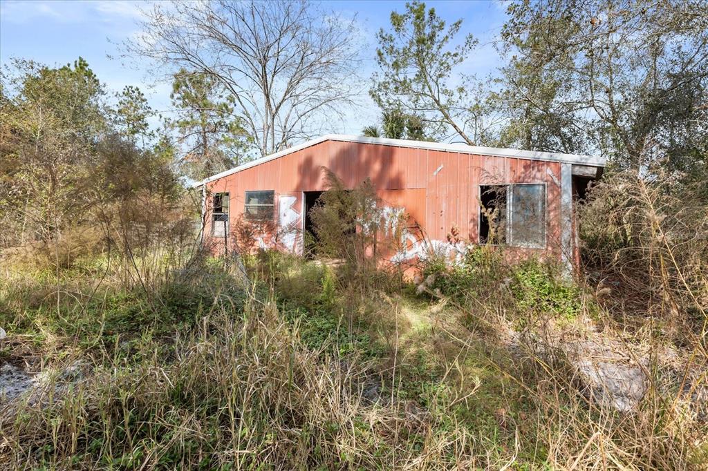 1705 Sunset Trail Geneva, FL 32732 - Photo 15 of 19 a view of a backyard