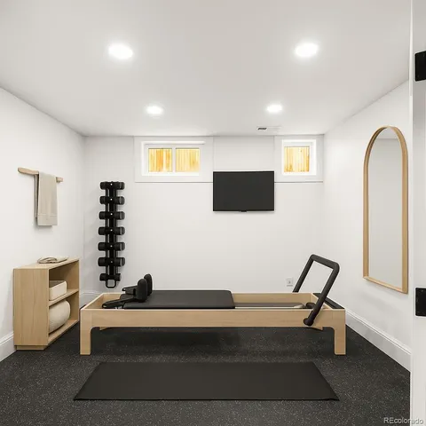 an aerial view of a house with a yard and garden