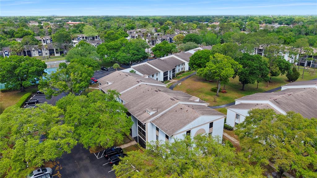 8203 Sun Spring Circle, Unit 62 Orlando, FL 32825 - Photo 15 of 19 an aerial view of a house with yard