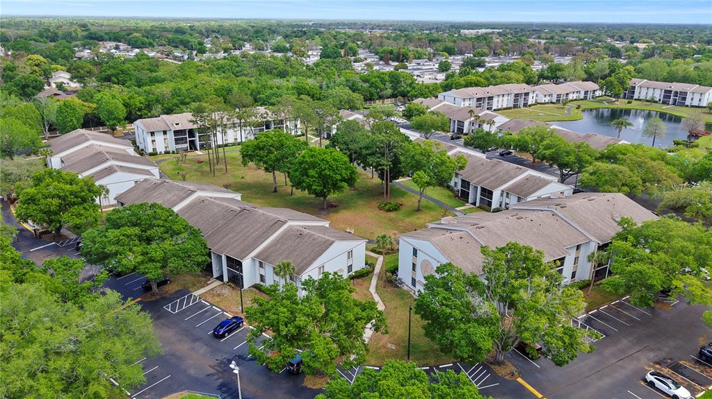 8203 Sun Spring Circle, Unit 62 Orlando, FL 32825 - Photo 17 of 19 an aerial view of a city with lots of residential buildings