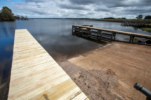 a view of lake with mountain in background