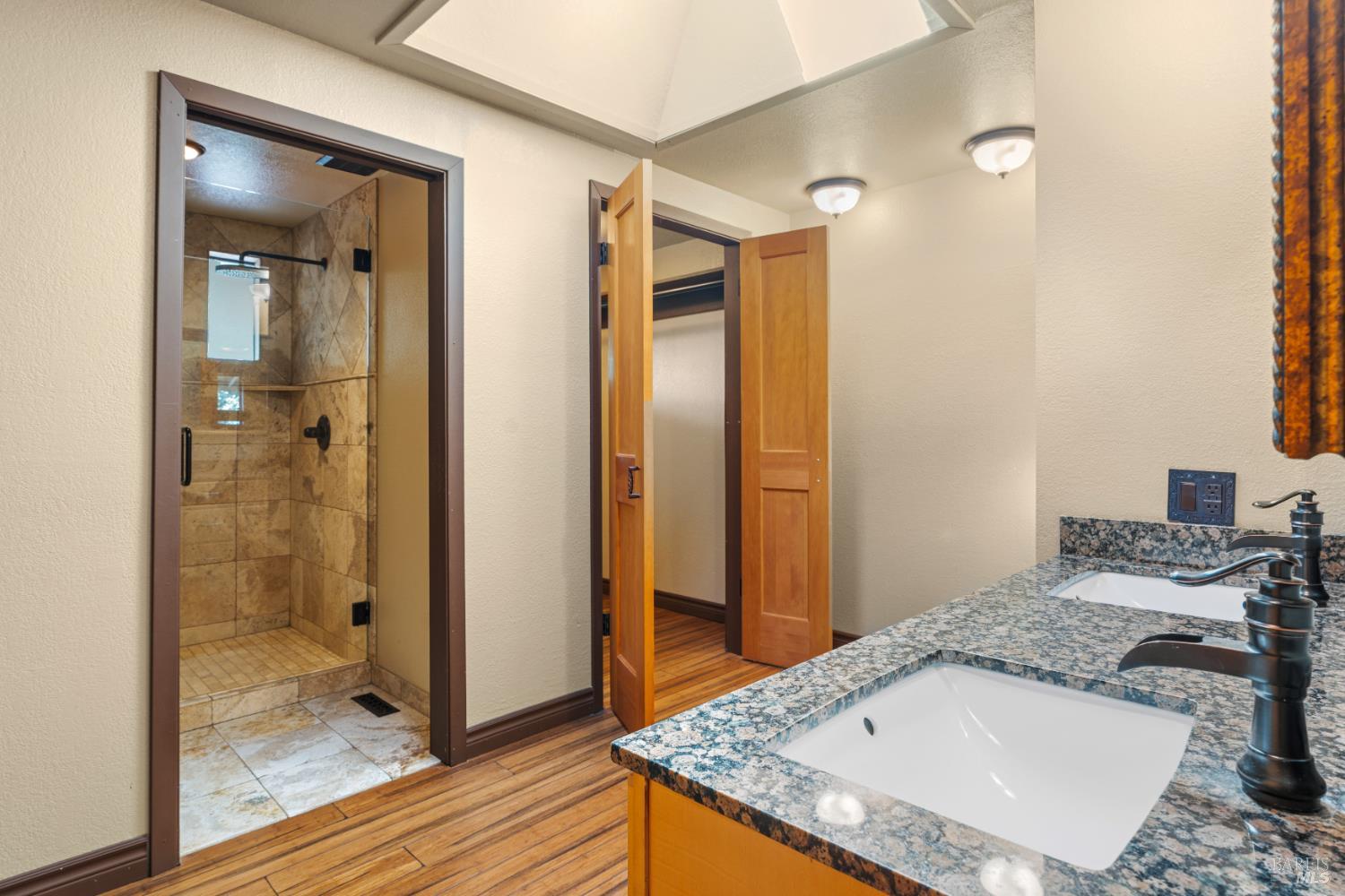 888 Watson Road Ukiah, CA 95482 - Photo 14 of 39 a bathroom with a granite countertop sink and a mirror