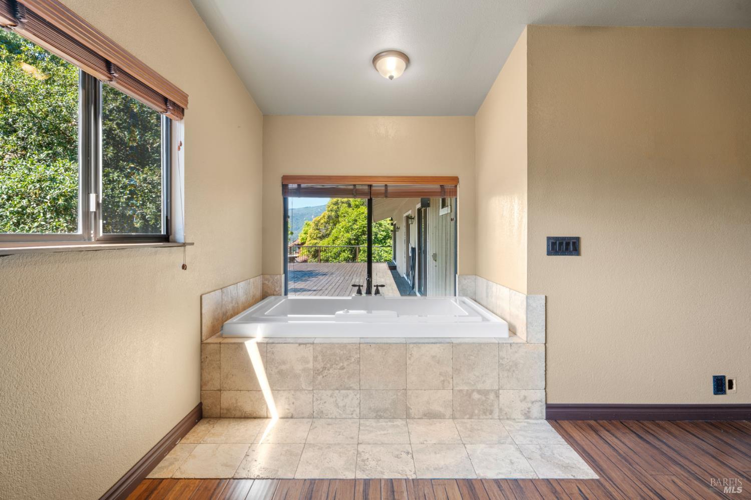 888 Watson Road Ukiah, CA 95482 - Photo 18 of 39 a room with wooden floor and window