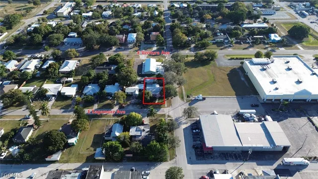 an aerial view of waterside residential houses with outdoor space