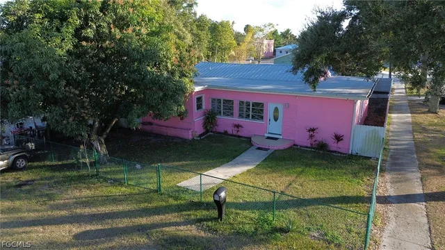 a bathroom with a toilet a sink and bathtub