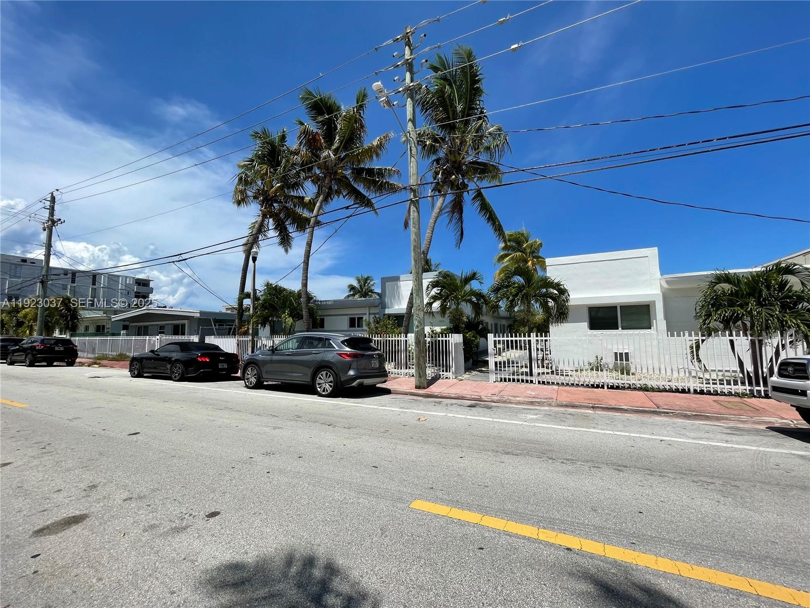 8215 Crespi Boulevard, Unit 4 Miami Beach, FL 33141 - Photo 1 of 34 a view of a street with cars on road