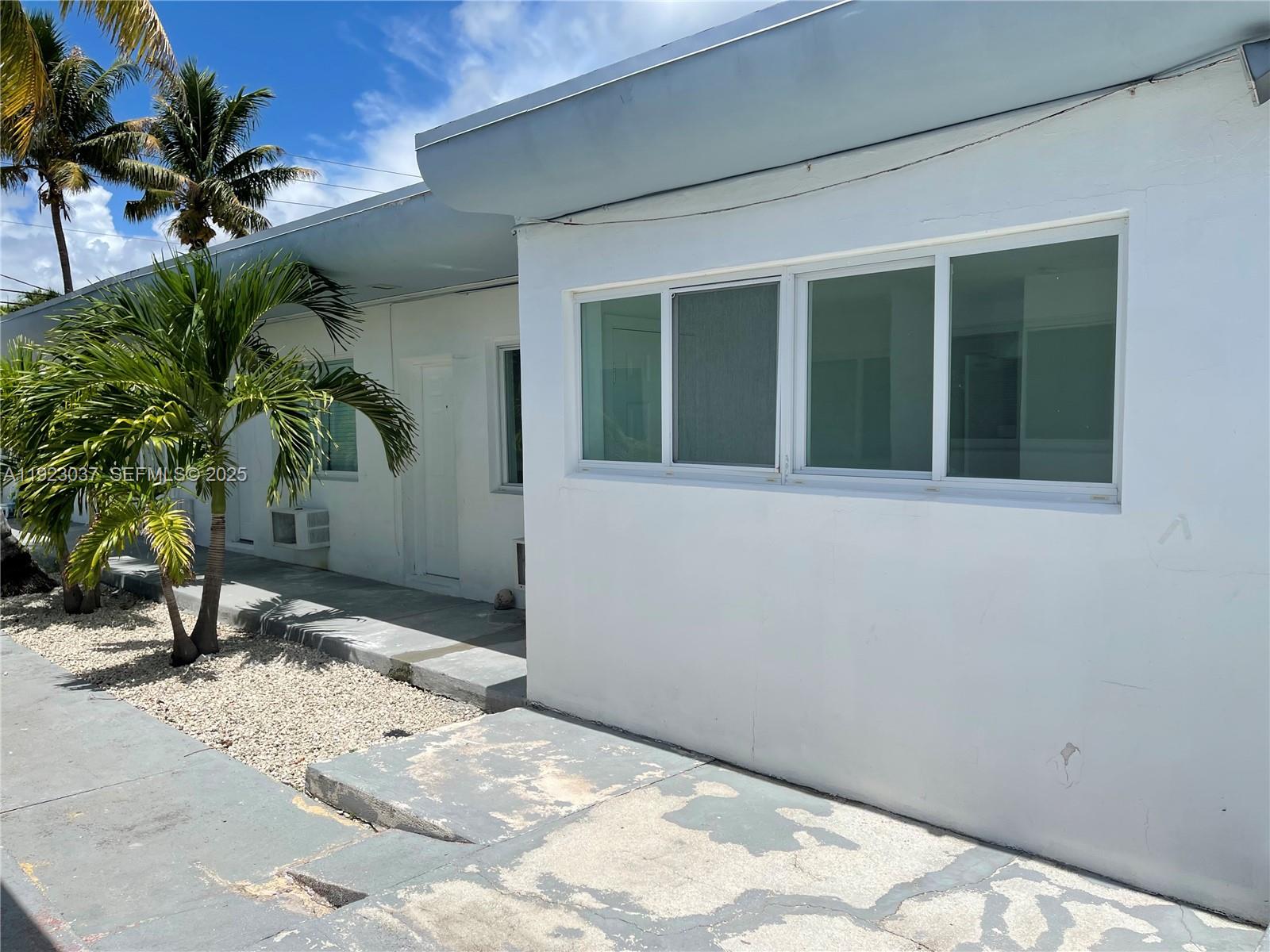 8215 Crespi Boulevard, Unit 4 Miami Beach, FL 33141 - Photo 29 of 34 a view of a entrance door of the house