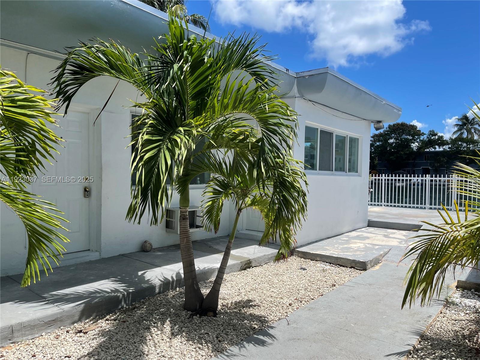 8215 Crespi Boulevard, Unit 4 Miami Beach, FL 33141 - Photo 30 of 34 a view of a backyard