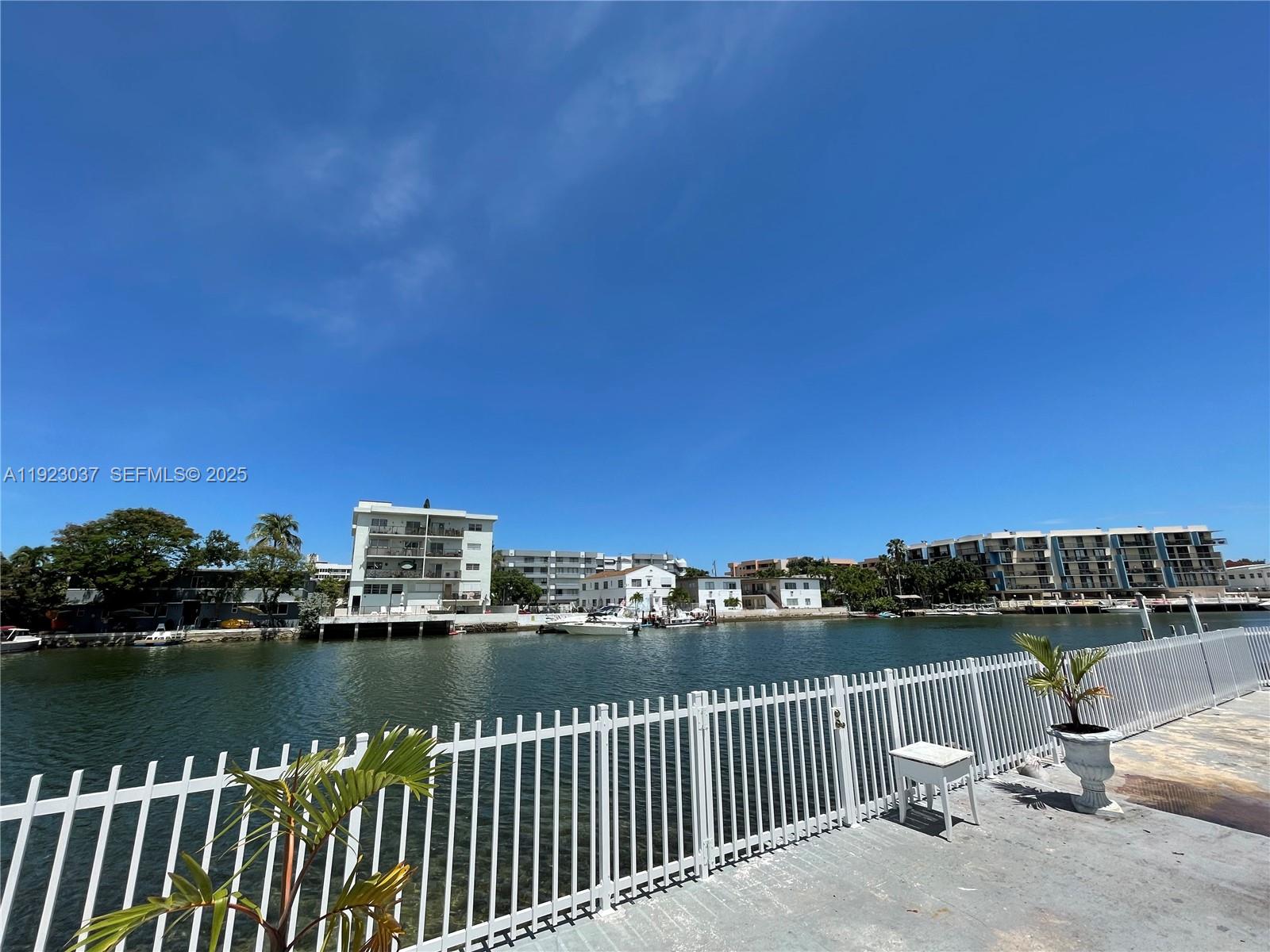 8215 Crespi Boulevard, Unit 4 Miami Beach, FL 33141 - Photo 34 of 34 a view of city from a lake