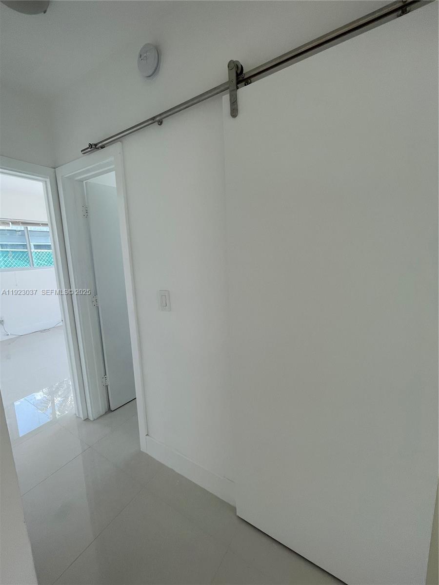 8215 Crespi Boulevard, Unit 4 Miami Beach, FL 33141 - Photo 9 of 34 a view of closet