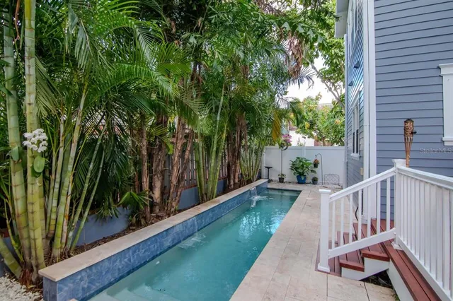 a view of backyard with green space