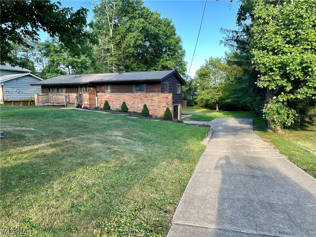 5855 Liberty Road Solon, OH 44139 - Photo 19 of 19 View of side of property featuring a yard