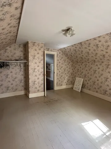 a view of room with gym equipment