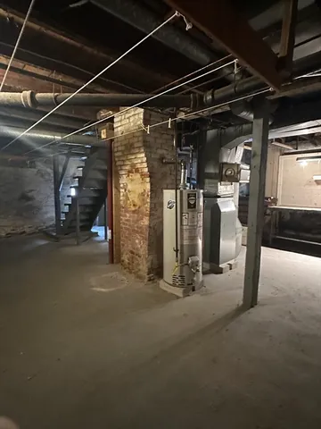 a view of a room with wooden walls