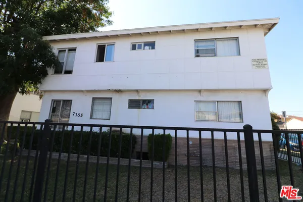 a front view of a house with a balcony