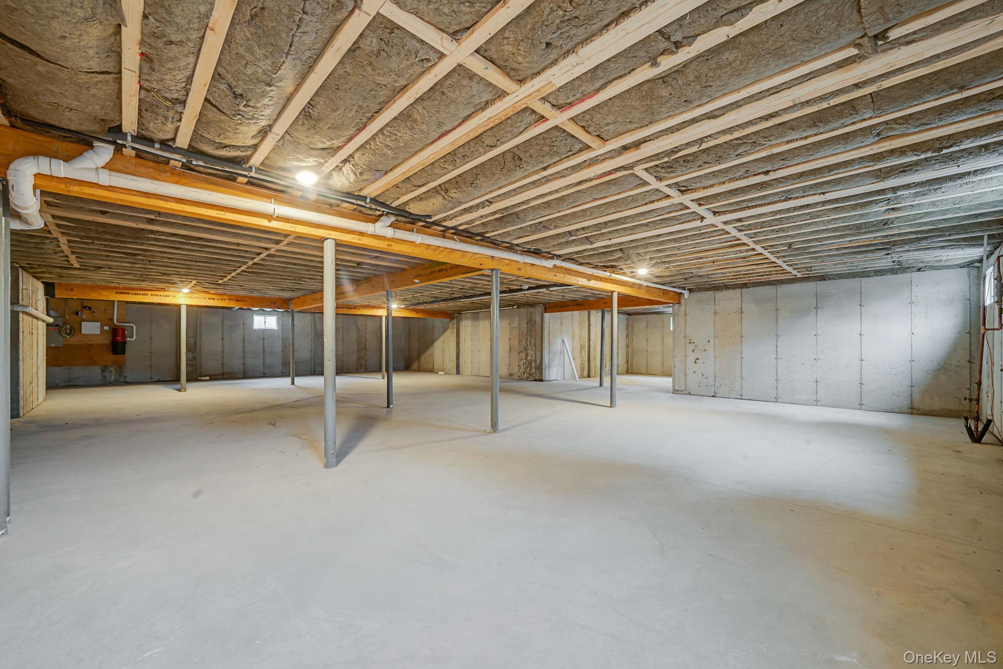 64 Blydenburgh Road Centereach, NY 11720 - Photo 23 of 29 a view of an empty room with a window