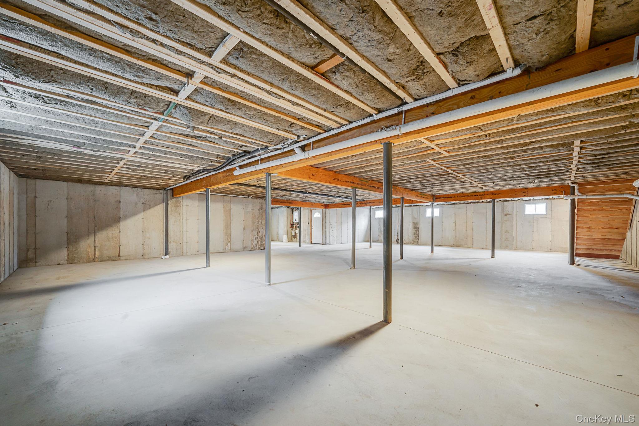 64 Blydenburgh Road Centereach, NY 11720 - Photo 24 of 29 a view of a hall with wooden floor