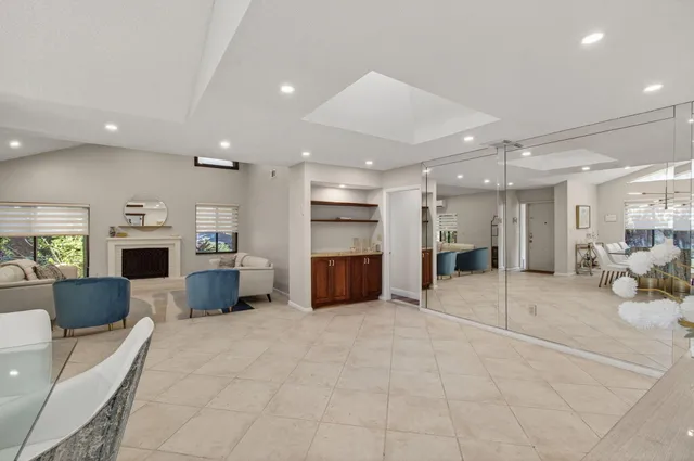 a bedroom with a bed and a dresser in it