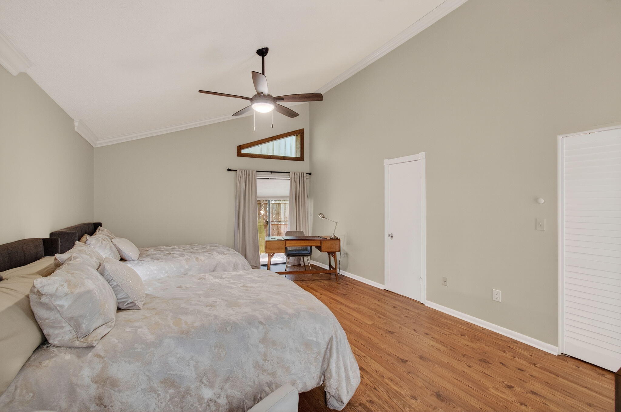 7745 Stanway Place Boca Raton, FL 33433 - Photo 32 of 90 a bedroom with a bed and a chandelier