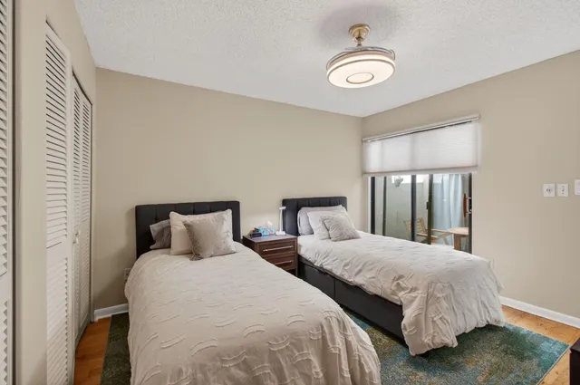 an aerial view of a house with a garden
