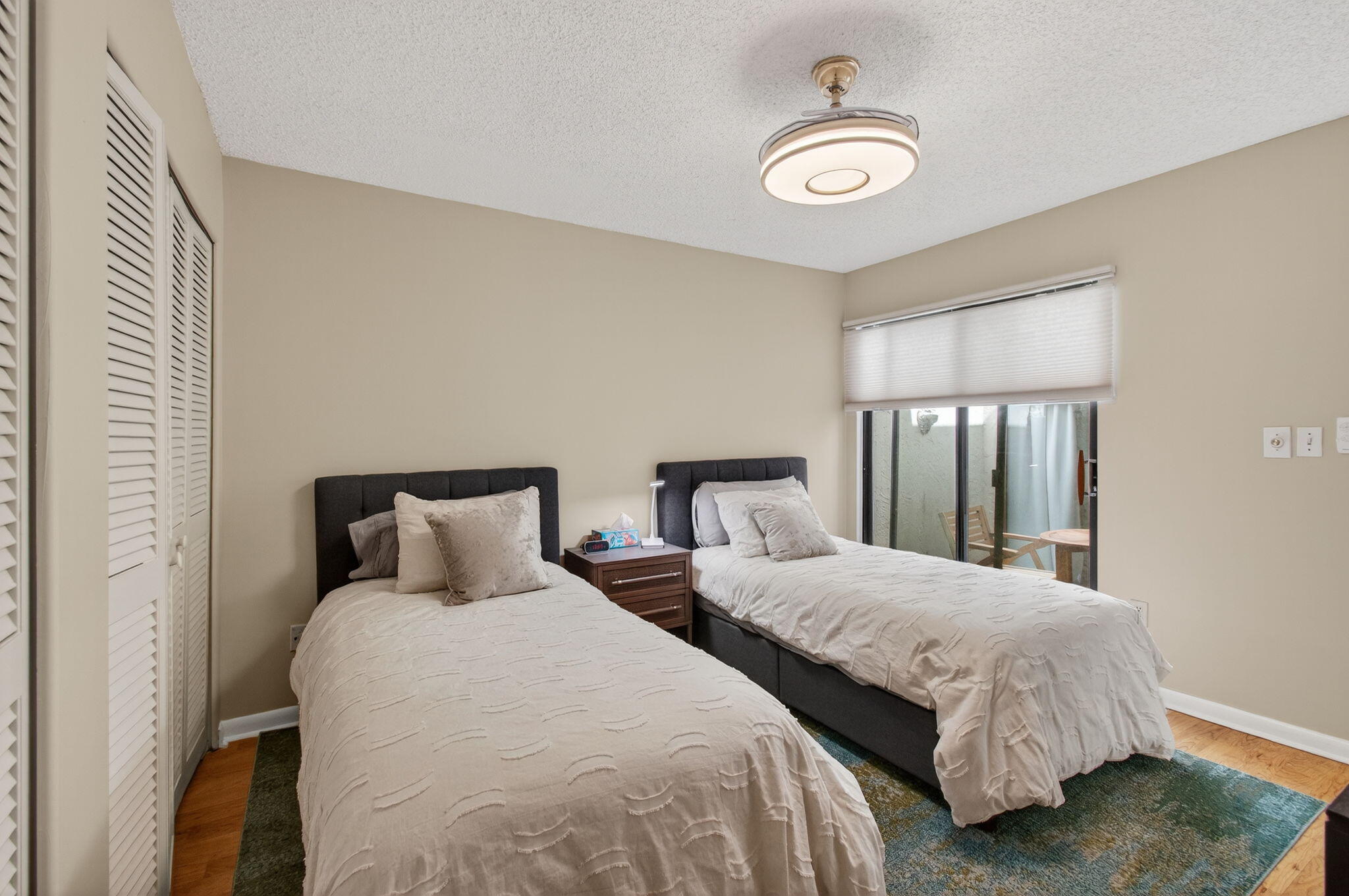 7745 Stanway Place Boca Raton, FL 33433 - Photo 44 of 90 a bedroom with two beds and painting on the wall