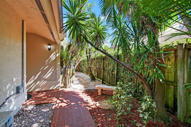 a view of a back yard of the house