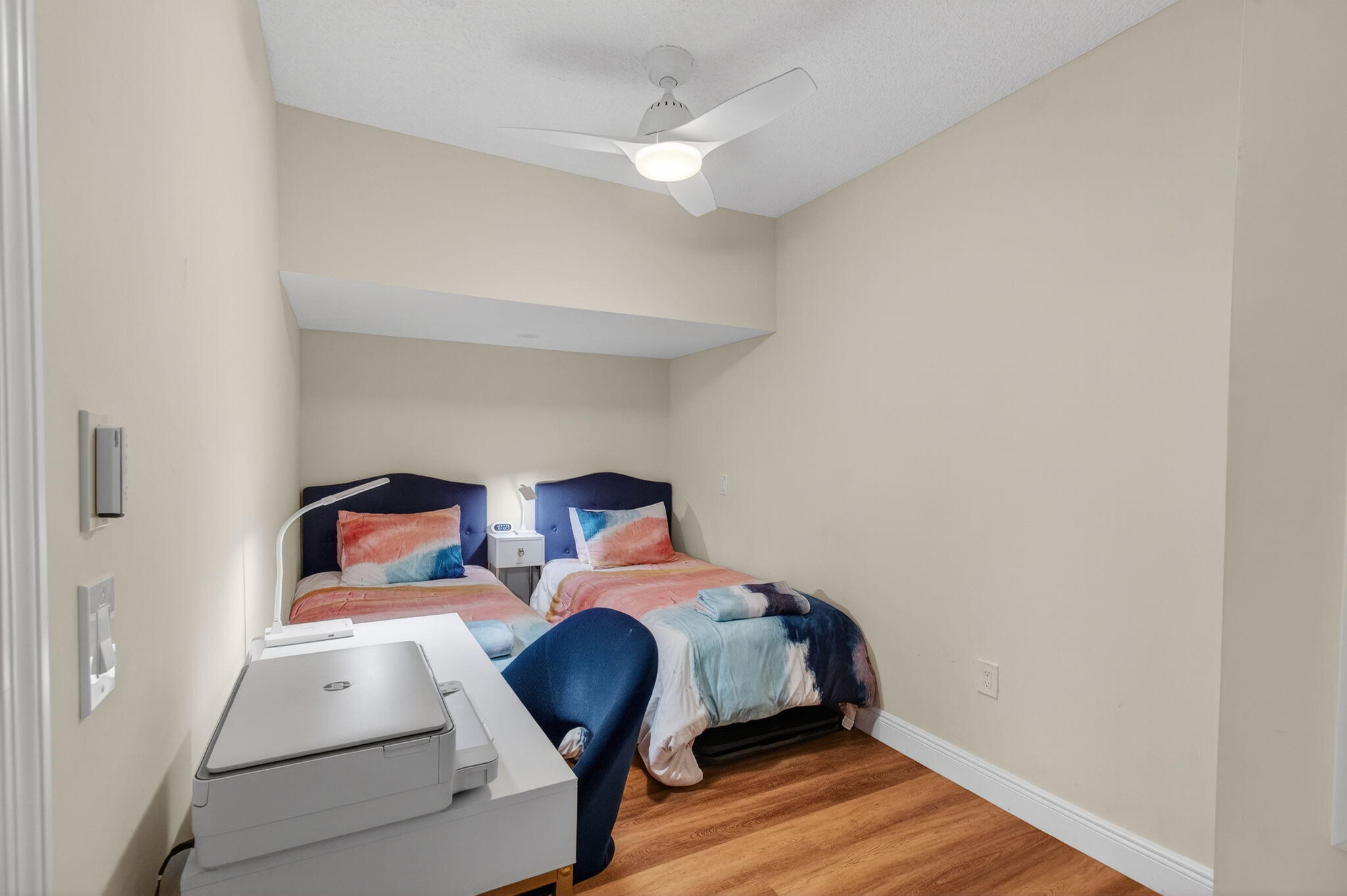 7745 Stanway Place Boca Raton, FL 33433 - Photo 53 of 90 a room with two chair and wooden floor