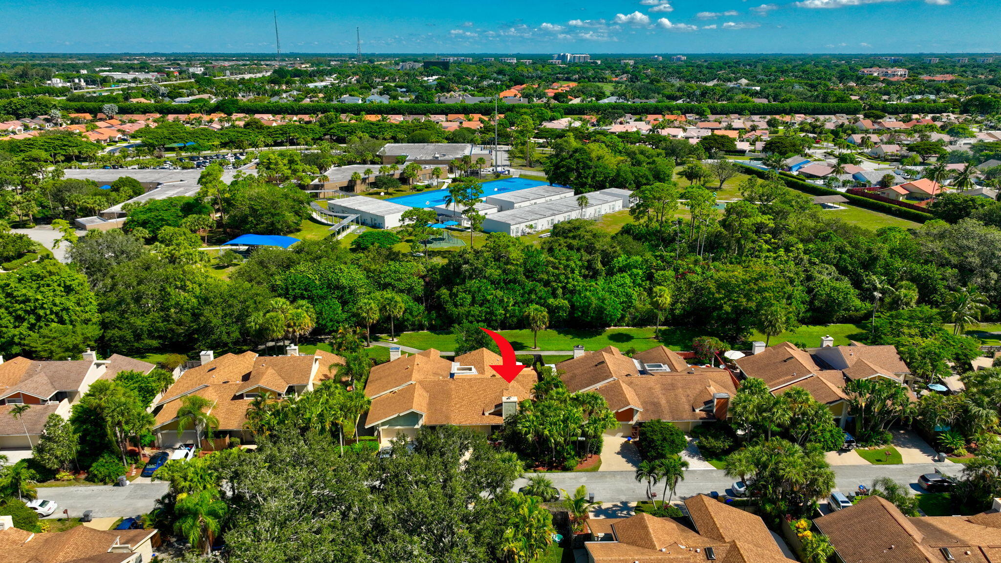 7745 Stanway Place Boca Raton, FL 33433 - Photo 72 of 90 an aerial view of residential houses with outdoor space and trees