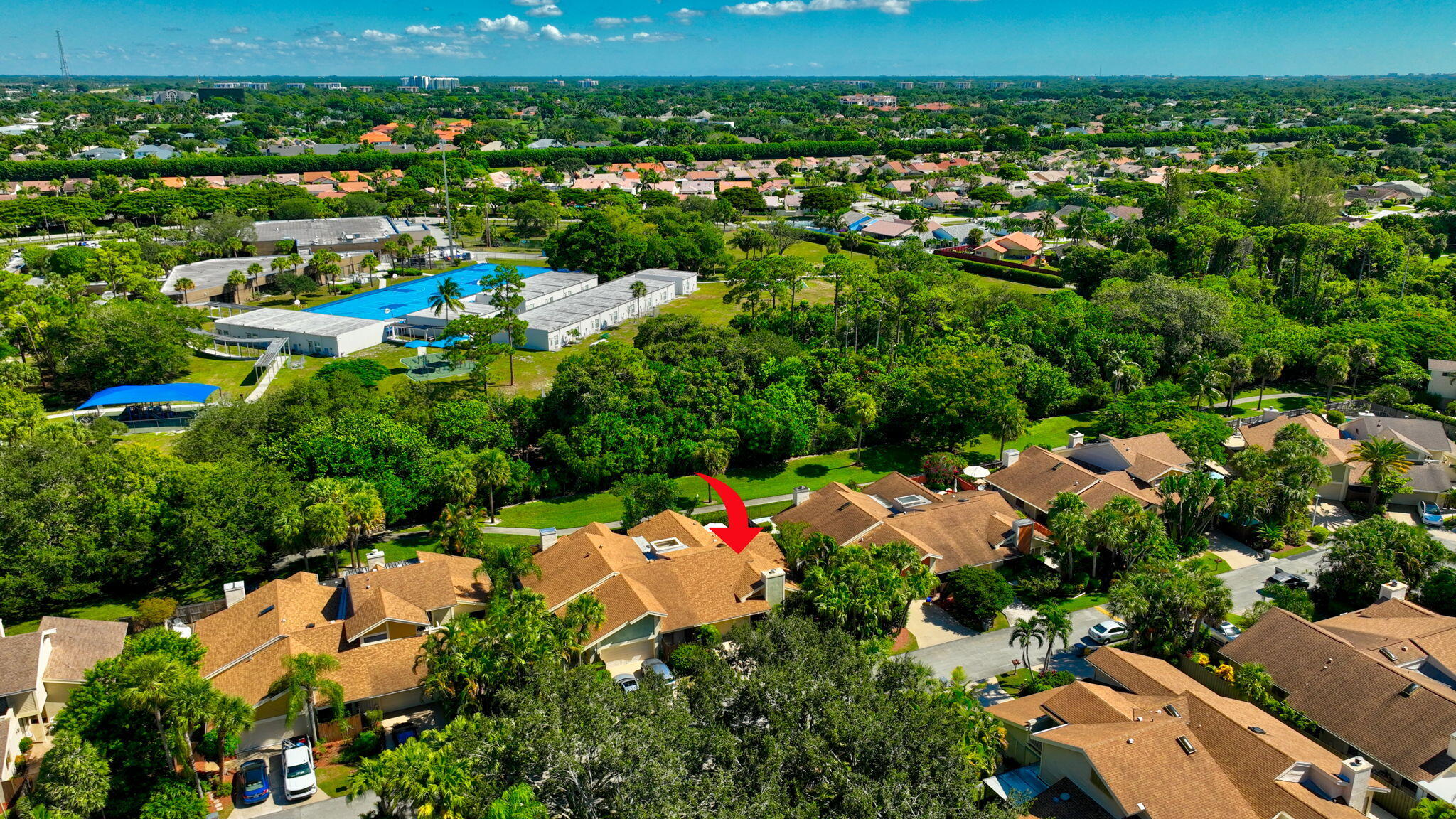 7745 Stanway Place Boca Raton, FL 33433 - Photo 73 of 90 an aerial view of residential houses with outdoor space and trees