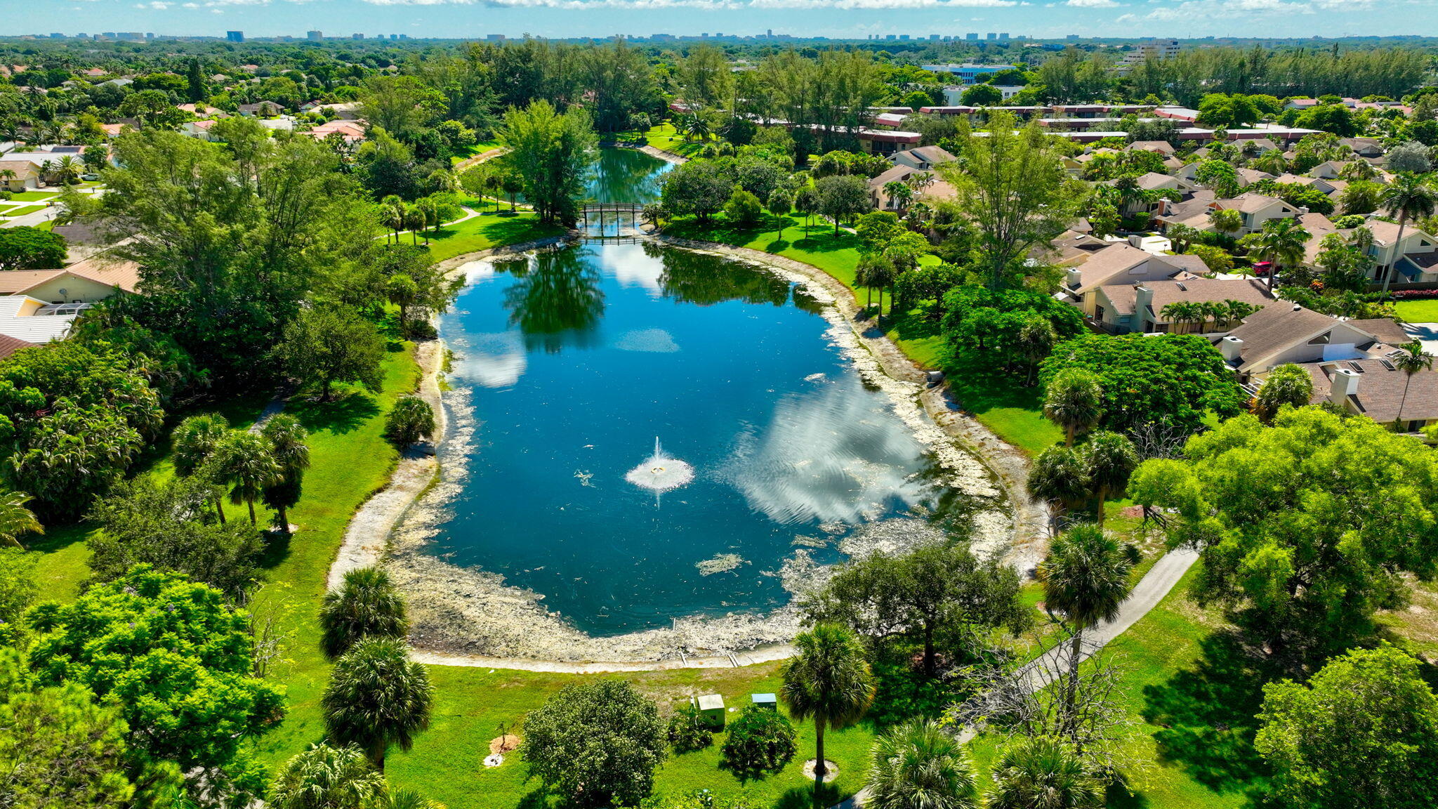7745 Stanway Place Boca Raton, FL 33433 - Photo 84 of 90 an aerial view of residential houses with outdoor space and trees