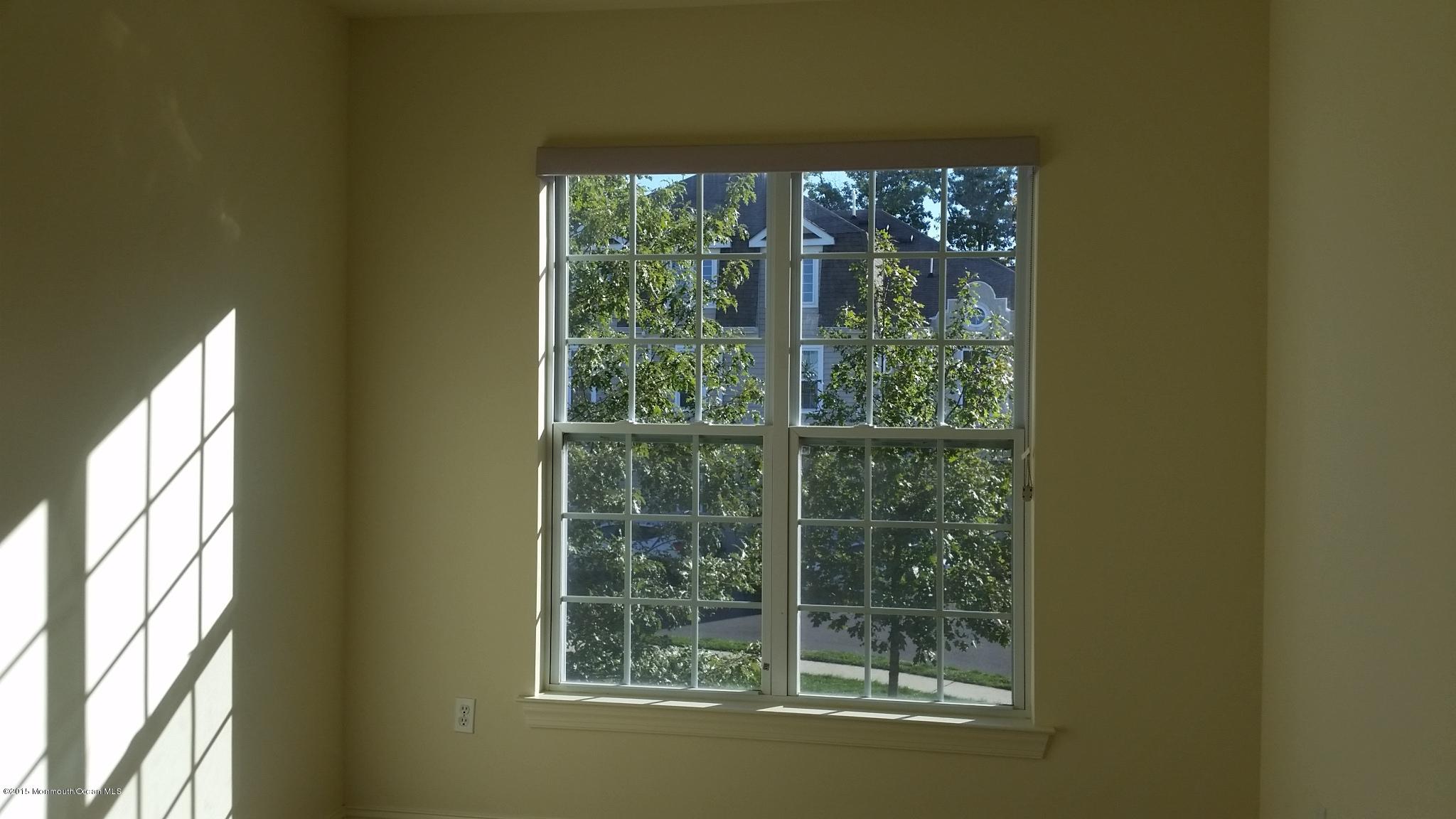 902 Abby Road Middletown, NJ 07748 - Photo 21 of 61 a view of a room that has a window