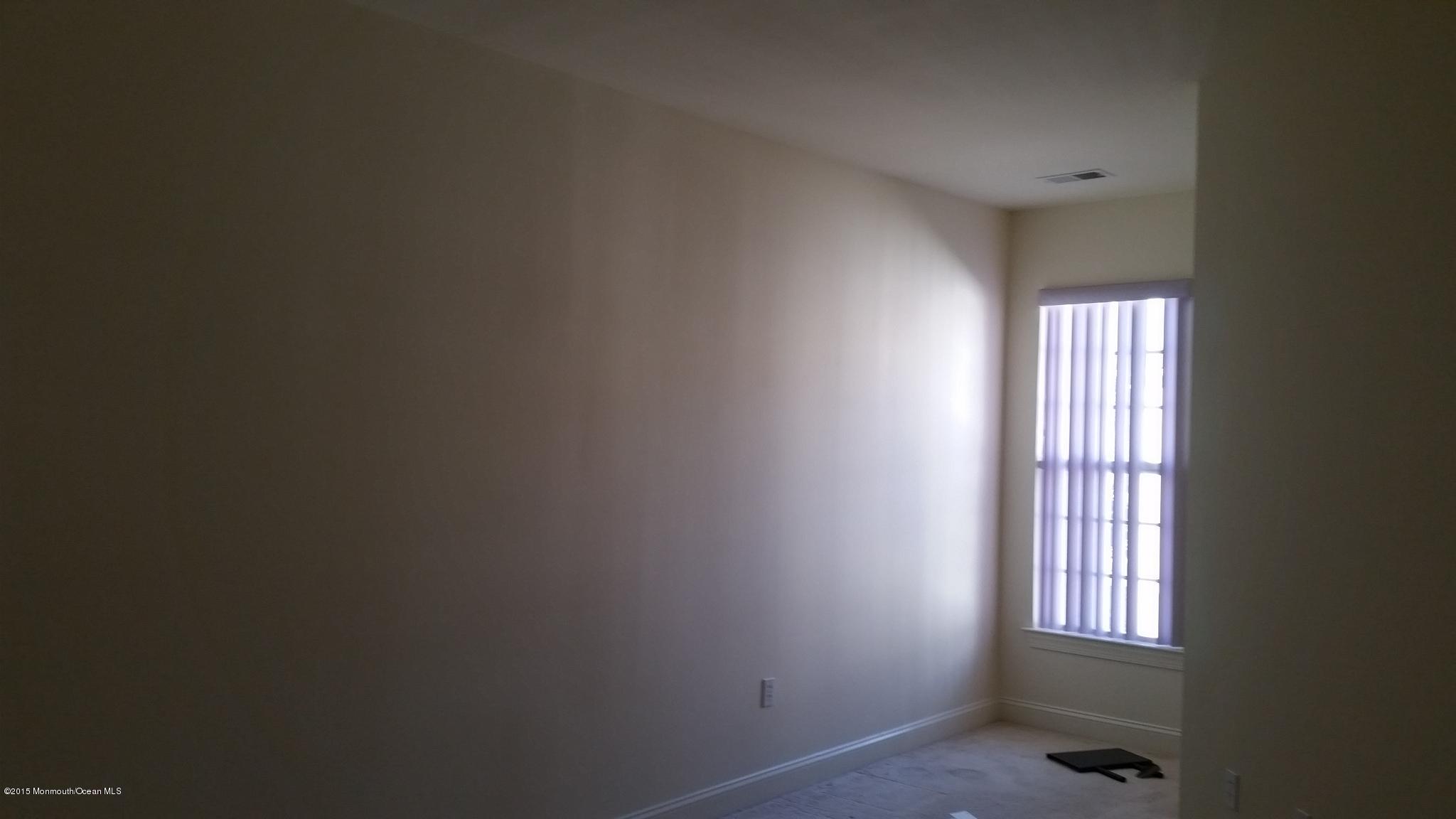902 Abby Road Middletown, NJ 07748 - Photo 23 of 61 a view of an empty room and window