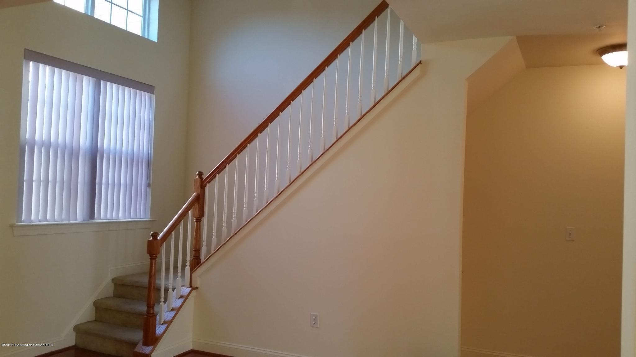 902 Abby Road Middletown, NJ 07748 - Photo 35 of 61 a view of entryway with wooden floor
