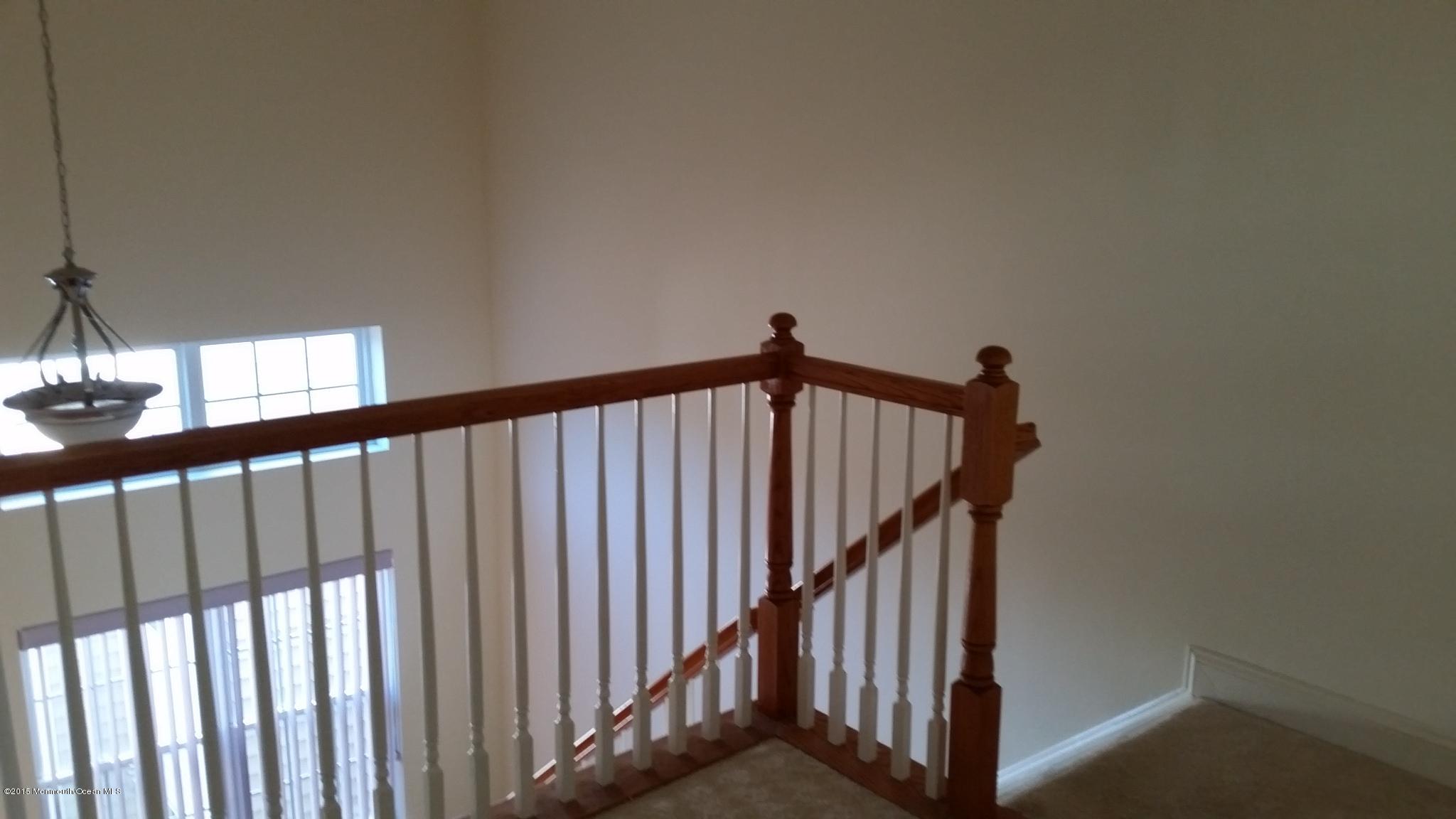902 Abby Road Middletown, NJ 07748 - Photo 45 of 61 a view of staircase with rug floor