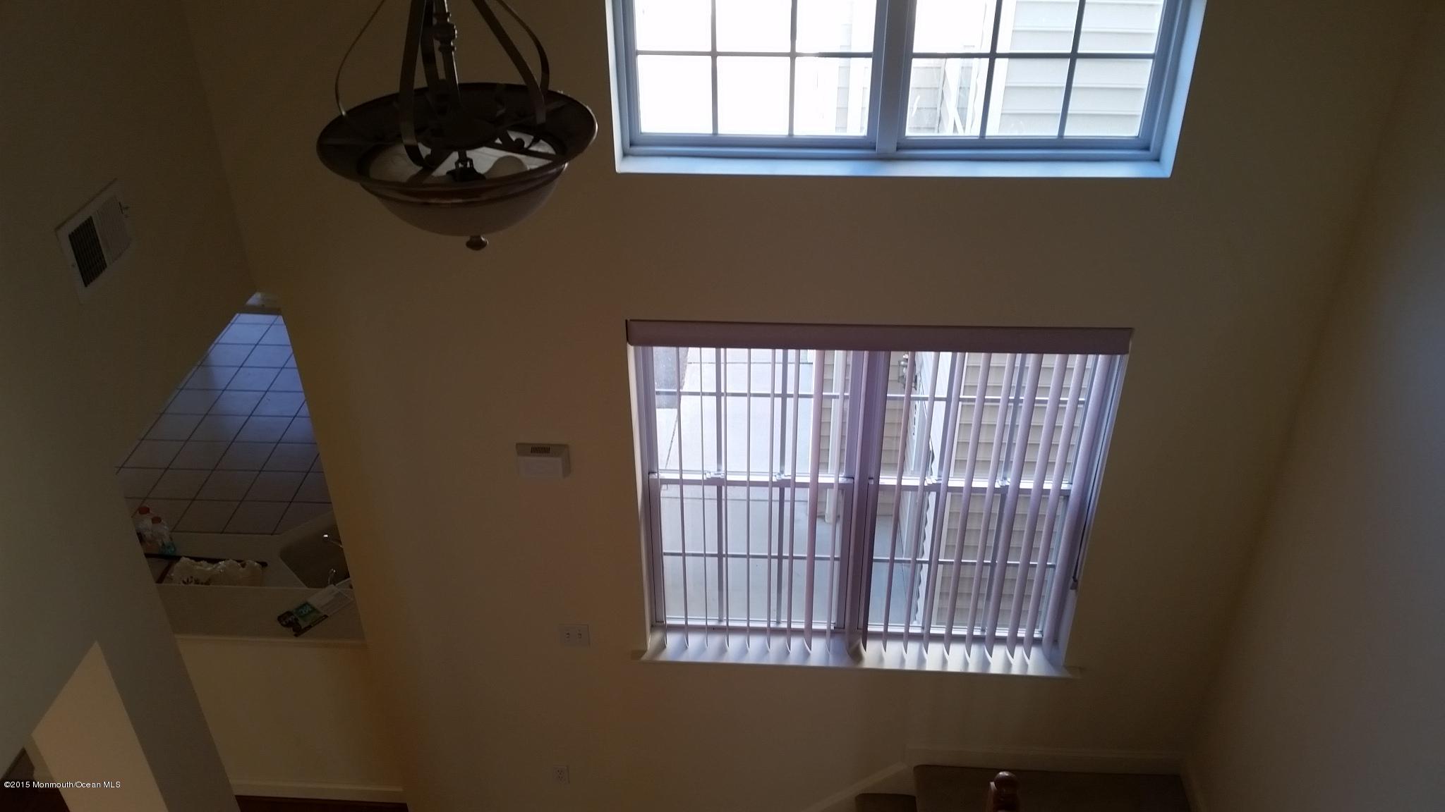 902 Abby Road Middletown, NJ 07748 - Photo 47 of 61 wooden floor in a bathroom next to a window