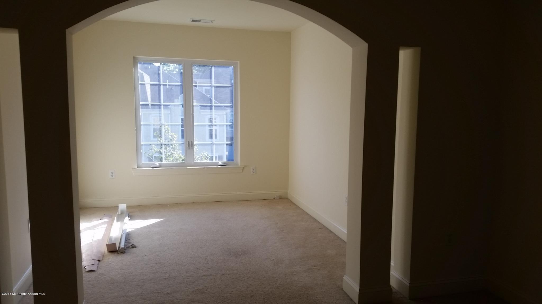 902 Abby Road Middletown, NJ 07748 - Photo 49 of 61 a view of empty room with windows