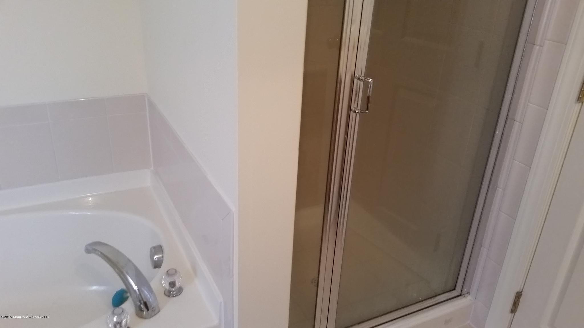902 Abby Road Middletown, NJ 07748 - Photo 55 of 61 a bathroom with a shower
