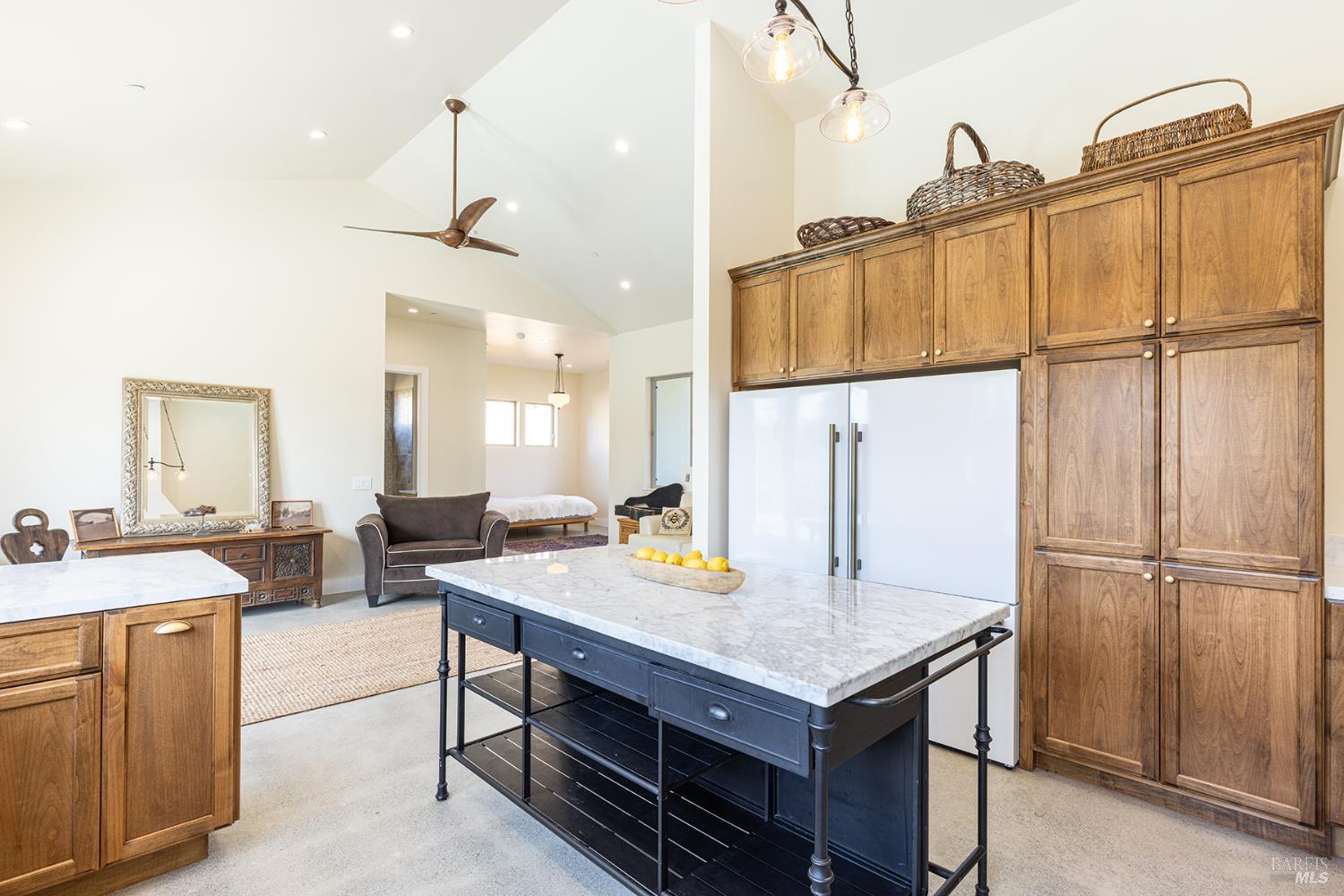 753 Sunnyside Road St. Helena, CA 94574 - Photo 14 of 55 a kitchen with a sink a stove and chairs