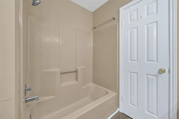 a bathroom with a bathtub