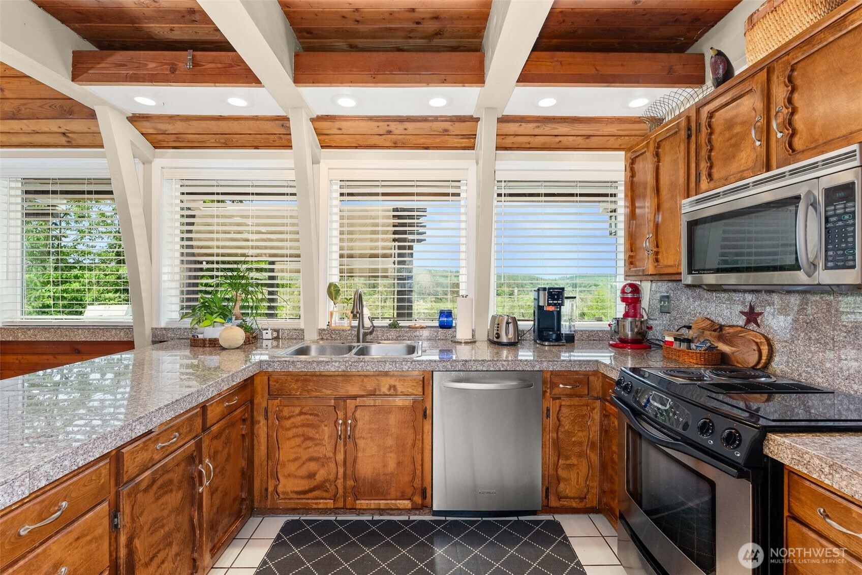 1508 Bloomhardt Road Raymond, WA 98577 - Photo 15 of 40 a kitchen with sink a stove and a microwave